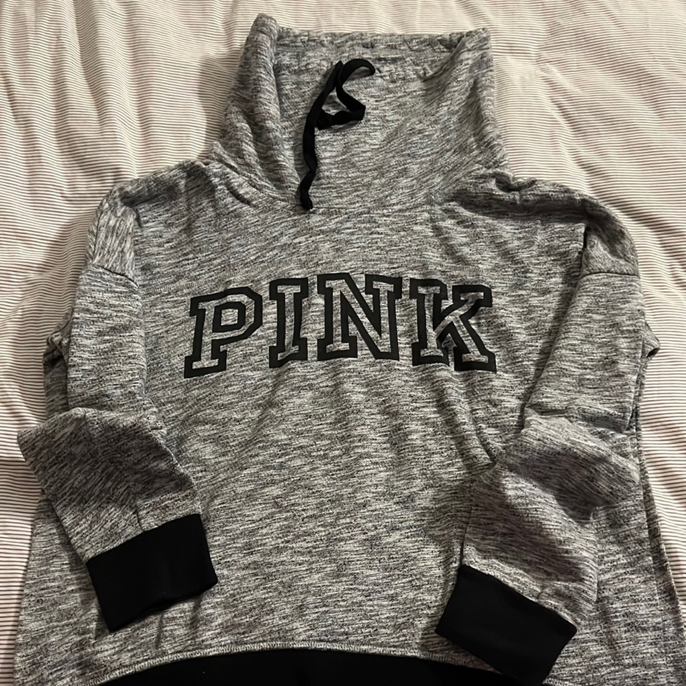 Pink sweater grey and black size Large